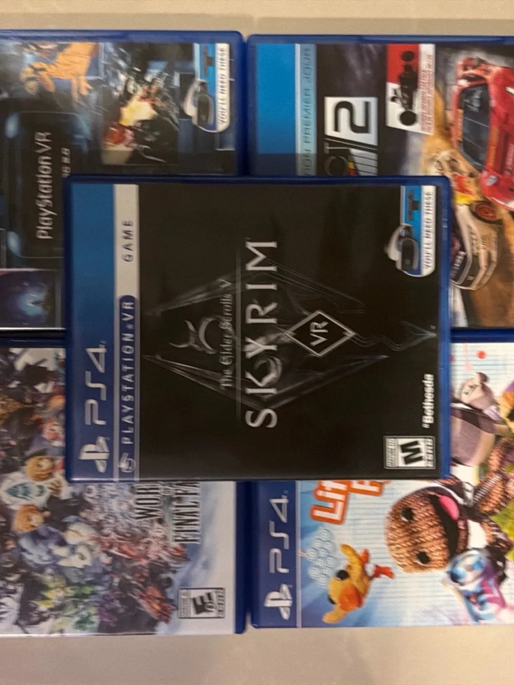 Sony PlayStation VR Headset with Black PS4 Slim Console and Blue/Red Controllers